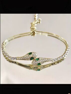 Gold Snake Head Slider Bracelet with Emerald Accents